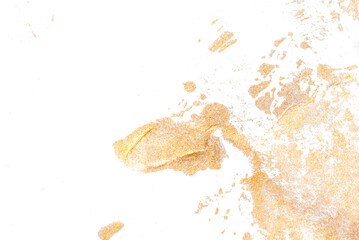 Aged texture created with gold acrylic paint on white background.