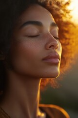 Fototapeta premium A close-up shot of a woman's face with her eyes closed, suitable for use in stories about introspection or contemplation