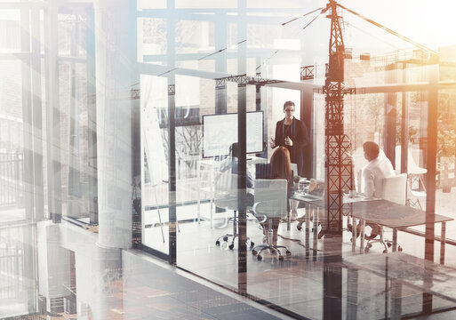 Business people, meeting or presentation with double exposure for statistics, financial growth or corporate analytics at office. Group, employees or coaching staff with overlay for company profit