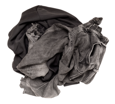 Crumpled pile of dark gray clothes on transparent background. Top view, high angle, flat lay. Ideal for themes related to fashion, laundry, recycling. Cut out clothing.