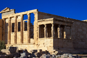 Portico of the Caryatids of the Erechtheum temple. This is ancient Ionic temple on the north side of Acropolis in Athens, Greece