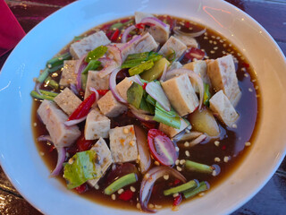 Street food in Thailand Spicy pork sausage salad