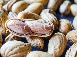 Close-up of boiled peanuts, Many fresh  peanuts as background, top view