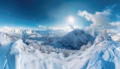 Panoramic View of Snow-Covered Mountains Under a Bright Blue Sky