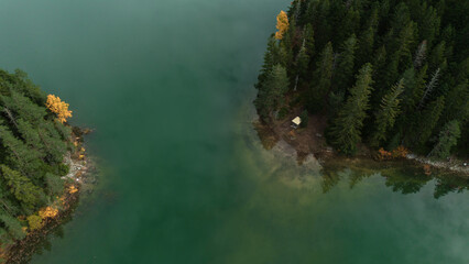 Top aerial view from drone of Black Lake - Crno Jezero. Calm autumn landscape scene of Durmitor National Park, Zabljak location in north of Montenegro Europe. Beauty of nature concept.