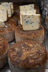 Pieces of tasty Blue Basque Fume smoked sheep cheese produced in south-western France, Northern Basque Country