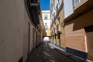 Walking through Cadiz, one of oldest cities and ports in Europe on Atlantic Ocean in southern Spain in Andalusia, tourists destination