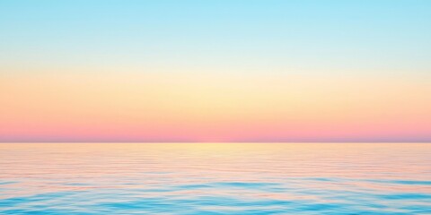 Naklejka premium Tranquil seascape with pastel sky and calm water at sunset.