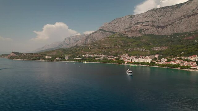 Cruise Ship Sailing Along Kneza Bay Near Korcula Town In Racisce, Croatia. Aerial Wide Shot