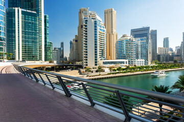 Beautiful view of Dubai Marina in a sunny day. Vacation, holiday, vacation in Dubai, UAE.