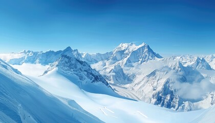 Naklejka premium Snowy Mountain Range with a Clear Blue Sky