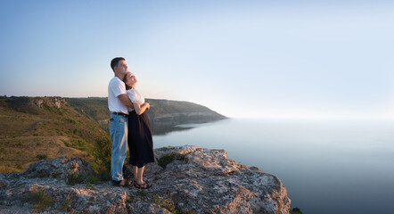 Husband and wife on the rock