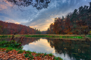 Fototapeta premium Autumnal scenery and the railway bridge in Rutki, Kashubia. Poland