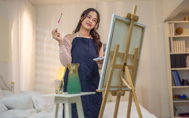 Woman Painting at Home Studio