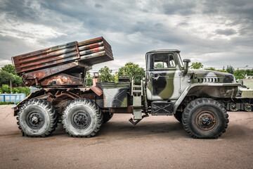 Naklejka premium Rusty Launcher of volley fire BM Grad based on the military truck. Reactive fire system.