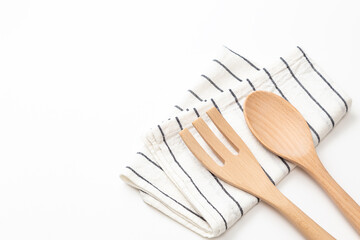 白背景に調理用スプーンとフォーク
