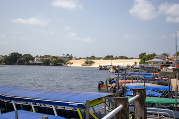 boat on the Preguiças river located in Barreirinhas Maranhão Brazil Lençois Maranhenses blue sky bridge