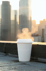 Urban eco-friendly coffee cup mockup on rooftop during sunrise, perfect for cafe branding campaigns