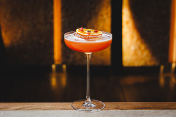 Chic serving of cocktails at the bar, Brandy, whiskey, apricot, orange.