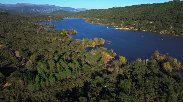 Wide aerial horizontal view of Lake of Saint-Cassien in France