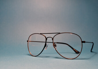 glasses on a blue background