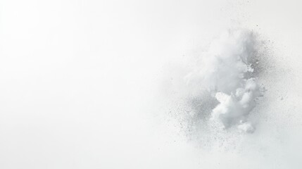 A white background with a cloud of white powder