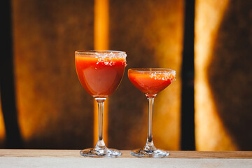 Assortment of alcoholic cocktails on the bar counter, nightlife, parties, holidays.