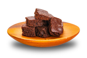 Pile of crispy brownie chocolate cube in wooden dish isolated on white background with clipping path.