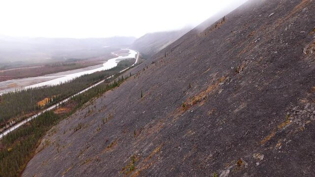 Steep Mountains Along Dempster Highway Near Engineer Creek In Yukon, Canada. Aerial Drone Shot