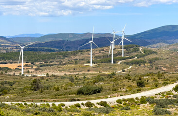 Wind turbine in mountains landscape. Eolic park windpower. Wind farm or New Wind green energy. Wind...
