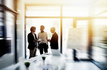 Presentation, meeting and group in boardroom, talking and brainstorming for project, sales and lens...