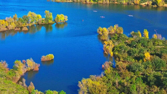 Aerial drone view of kayaks on the Lake of Saint-Cassien