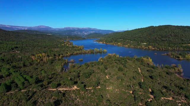 Wide aerial drone view of Lake of Saint-Cassien in provence