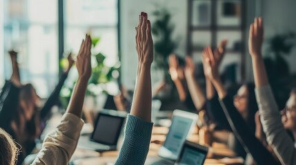 Hands raised in a meeting, expressing participation and engagement.