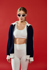 A beautiful sportswoman expresses emotion through her powerful pose, radiating confidence and style.