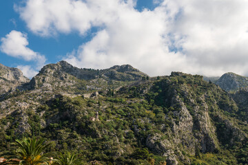 Walls of the Kotor Fortress with mountains and blue sky, Montenegro