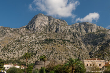 Walls of the Kotor Fortress with mountains and blue sky, Montenegro
