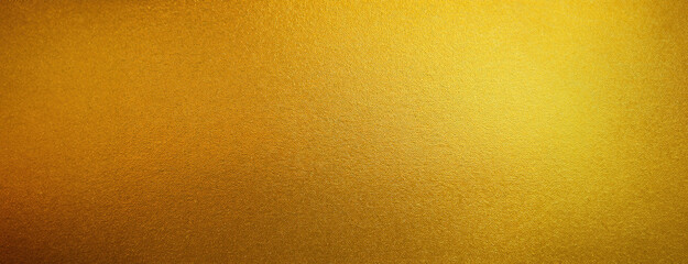 Obraz premium Solid gold textured background with a rough finish, offering a luxurious yet minimalist aesthetic.
