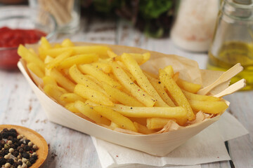 A plate with french fries potatoes