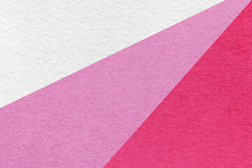 Texture of old craft white, lilac and purple color paper background, macro. Vintage abstract magenta cardboard