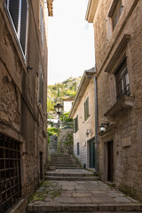 Picturesque medieval street in the old town district of the coastal city of Kotor