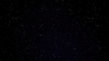 Obraz premium Clusters of twinkling stars scatter across the dark expanse of the night sky, starry