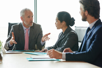 Discussion, feedback and business people in office with manager for finance revenue report review....