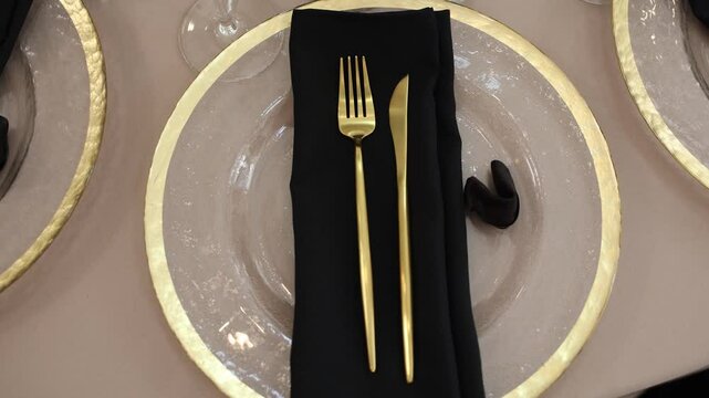 plate with knife and fork on table in restaurant