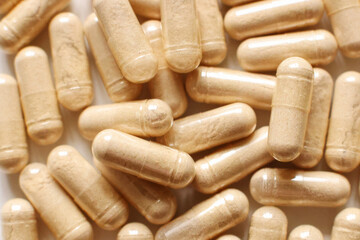 White medical capsules close up