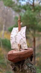 Wooden boat in forest