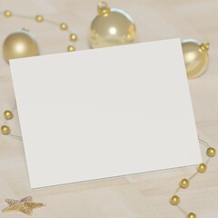 Christmas card mock up. Empty greeting card on wooden floor decorated with cute golden stars and ornaments. Season greetings template with copy space for text. Festive celebration.