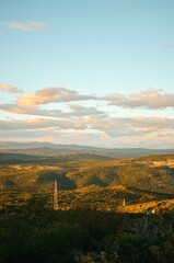 Naklejka premium View from the top of the mountain with forest on the Adriatic sea at a beautiful bright sunset 
