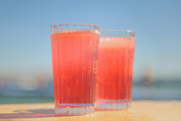 Two Glasses of Pink Fizzy Drink