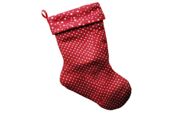 A festive red stocking with white polka dots, perfect for holiday decorations and gift-giving, against a transparent background.